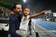 Alexis Ohanian and his daughter Olympia Ohanian react during the Athlos NYC at Icahn Stadium in New York City. (Photo Getty Images)
